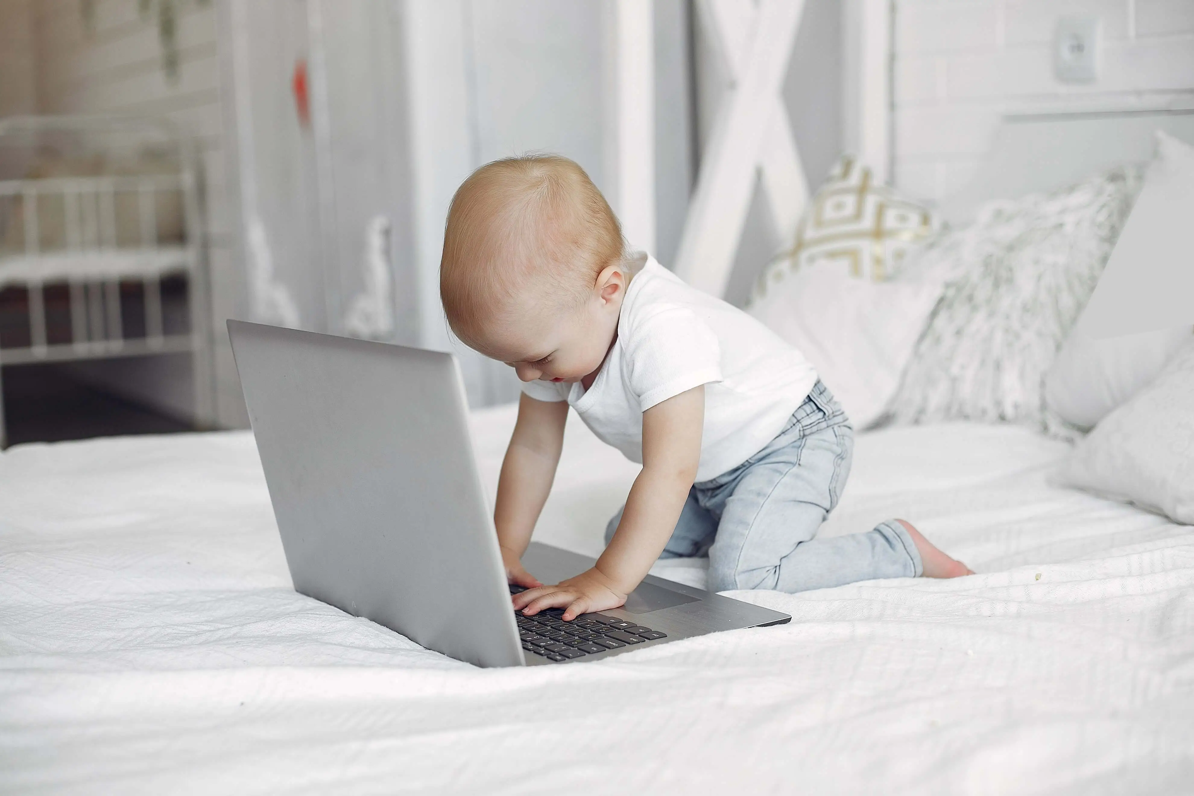 Laptop playing Baby playing on laptop